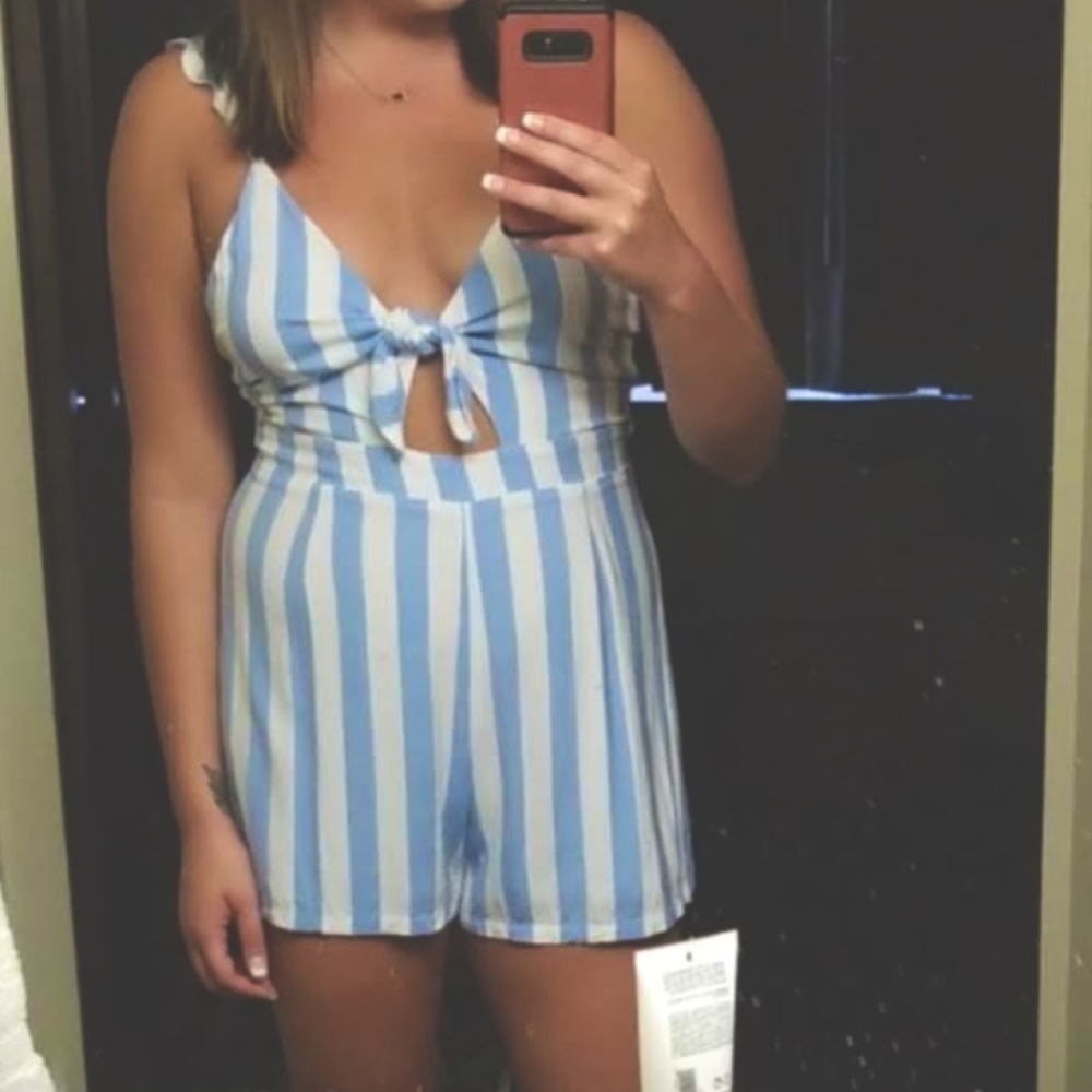 Blue and White striped Romper. 💛